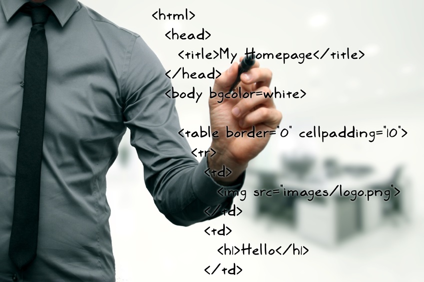 website development - programmer writing html code